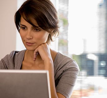 Business owner setting up pay per click advertising