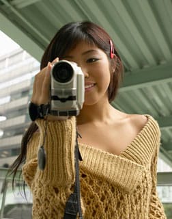 Small business owner creating a video website